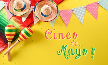Cinco de Mayo tatil geçmişi marakalardan, Meksika battaniye şeritlerinden ya da panço seraplardan ve sarı arkaplandaki şapkadan yapılır..
