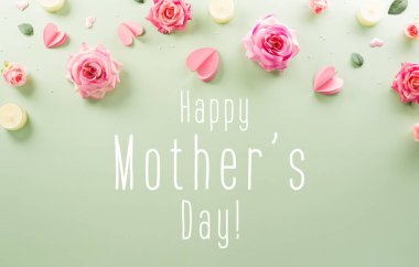 Anneler Gününüz kutlu olsun ve Pastel arka plandaki çiçekten yapılmış Kadınlar Günü dekorasyonu konseptiniz..