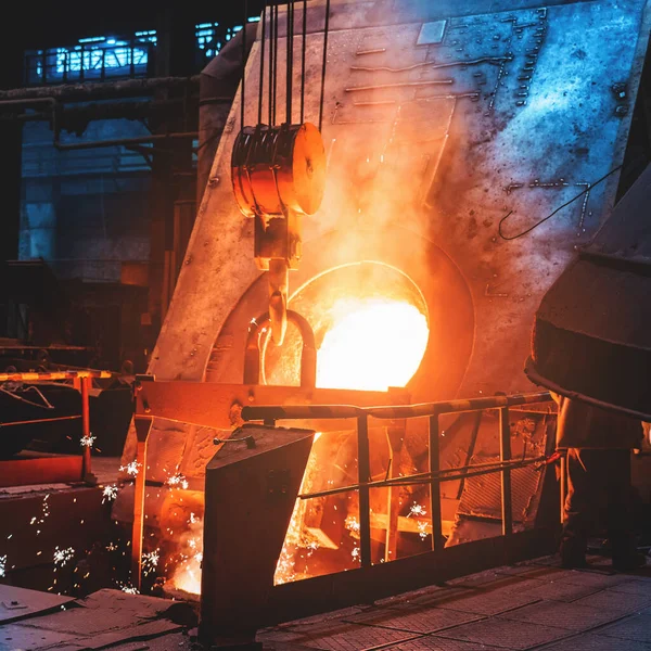 Blast Furnace smelt liquid iron in Steel Mill Foundry metallurgical industry. Liquid metal melt. Steelworks production factory.