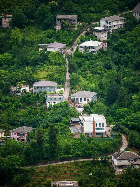 stock image Hillside Village with Lush Greenery. 