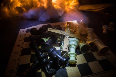 Concept of war or manipulation with global politics. Conceptual image of war using chess board and manipulation symbol. Selective focus