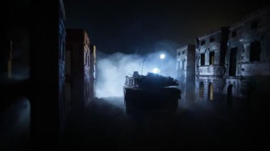 War Concept. Military silhouettes fighting scene on war fog sky background, World War Soldiers Silhouette Below Cloudy Skyline At night. Armored vehicles fight scene. Selective focus