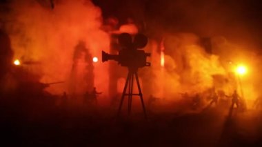 Action (War) movie concept. Burned out city destroyed in war. Military fighting silhouettes. Selective focus