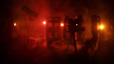 Action (War) movie concept. Burned out city destroyed in war. Military fighting silhouettes. Selective focus 