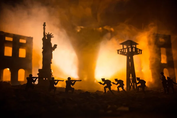 stock image Conceptual image of war between Democracy and dictatorship using toy soldiers. Battle in ruined city. Selective focus