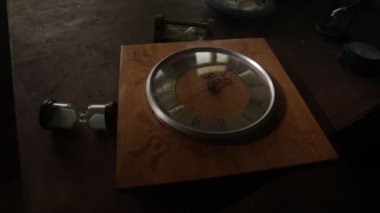 Time concept. Many clocks on old wooden table with copy space studio shot