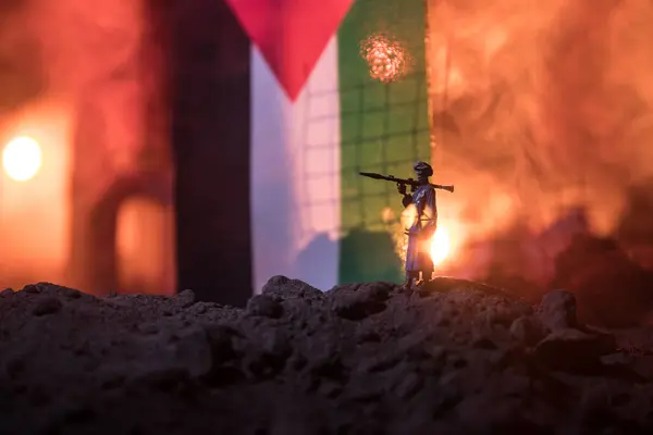 Conflict between Israel and Palestine concept. Burning and destroyed city by war. Concept of crisis of war creative decoration. Selective focus