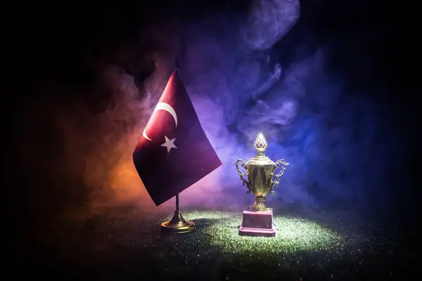 stock image National flag on grass. Concept winner of Euro 2024 football tournament in Germany. Dark background. Selective focus