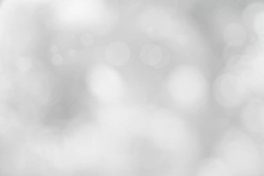 Arkaplan için soyut bulanık gri renk, Görüntü festivali ışıkları açık hava kutlaması ve kazanan için zarif beyaz bokeh odaklı dekoratif tasarım.