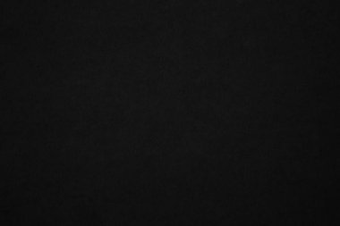 Black paper texture background. Black blank cardboard sheet page. Old vintage page dark grunge vignette. Pattern rough art rustic grunge letter. Material cardboard with copy space for luxury text.