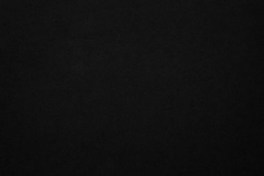 Black paper texture background. Black blank cardboard sheet page. Old vintage page dark grunge vignette. Pattern rough art rustic grunge letter. Material cardboard with copy space for luxury text.