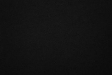 Black paper texture background. Black blank cardboard sheet page. Old vintage page dark grunge vignette. Pattern rough art rustic grunge letter. Material cardboard with copy space for luxury text.