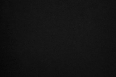 Black paper texture background. Black blank cardboard sheet page. Old vintage page dark grunge vignette. Pattern rough art rustic grunge letter. Material cardboard with copy space for luxury text.