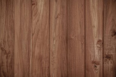 Kahverengi ahşap kaplama. Duvardan ve tahtadan yapılmış ahşap kalaslar, ahşap ahşap döşeme dekorasyonudur..