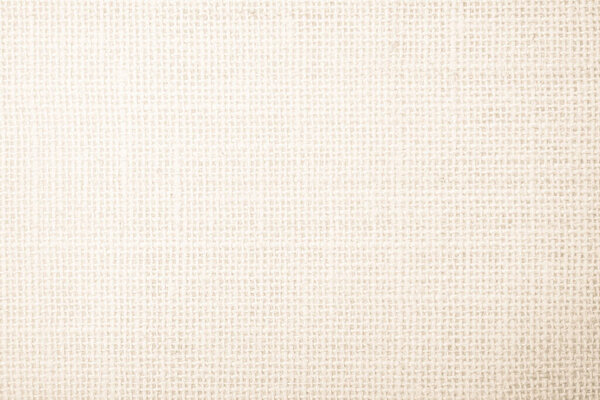Jute hessian sackcloth burlap canvas woven texture background pattern in light beige cream brown color blank. Natural weaving fiber linen and cotton cloth texture as clean empty for decoration.