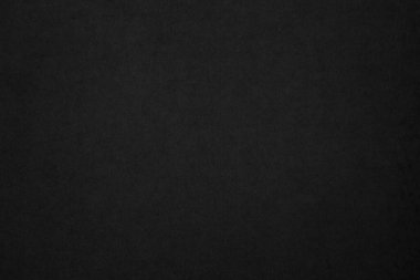 Black paper texture background. Black blank cardboard sheet page. Old vintage page dark grunge vignette. Pattern rough art rustic grunge letter. Material cardboard with copy space for luxury text.