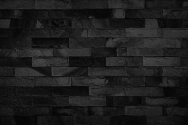 Soyut koyu tuğla duvar dokusu arka plan deseni, duvar tuğlası yüzey dokusu. Siyah renge boyanmış tuğla, eski temiz beton şebeke düzensiz, ev ya da ofis tasarımı arkaplan dekorasyonu.
