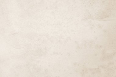 Renkli eski beton duvar dokusu arka planı. Retro düz krem rengi çimento duvar arkaplan dokusunu kapatın. Kağıt vintage parşömen ögesini görüntüde göster, tanıt veya tanıt.