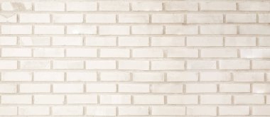 Geniş krem tuğla duvar dokusunun boş arkaplanı. Bej rengi eski tuğla duvar beton ya da taş desenli, duvar kağıdı kireçtaşı soyut. Krema ve beyaz tuğla duvar. Tuğla döşeme şablonu tasarımı.