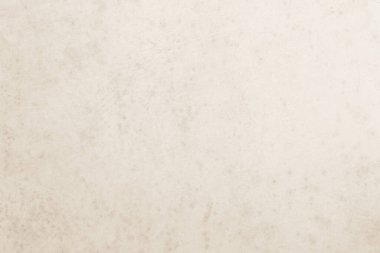 Renkli eski beton duvar dokusu arka planı. Retro düz krem rengi çimento duvar arkaplan dokusunu kapatın. Kağıt vintage parşömen ögesini görüntüde göster, tanıt veya tanıt.