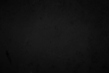 Black dark concrete wall background. Pattern board cement texture grunge dirty scratched for show anthracite promote product urban floor and abstract paper design element decor. Blackboard blank.