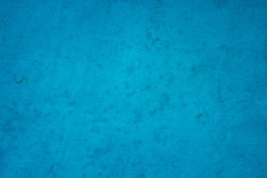 Yaz duvar kâğıdında arka plan için koyu mavi beton yapı. Çimento ve tondan oluşan kum duvar çok az. Açık renkli beton duvar, çimento deseni tasarım için nane yeşili..