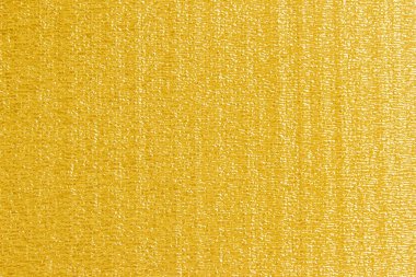 Altın folyo arka plan, altın arka plan. Soyut metal efekt kağıt folyo. Açık sarı renkli platinyum metalik doku. Altın parlak desenli modern fon. Gradyan hassas yüzey baskı tasarımı.