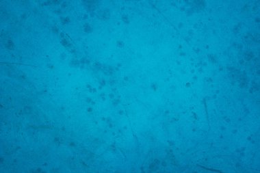 Yaz duvar kâğıdında arka plan için koyu mavi beton yapı. Çimento ve tondan oluşan kum duvar çok az. Açık renkli beton duvar, çimento deseni tasarım için nane yeşili..