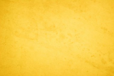 Yaz duvar kağıdındaki arka plan için sarı beton doku. Çimento ve tondan oluşan kum duvar çok az. Açık sarı renkli beton duvar, ev dekorasyonu için çimento dokusu beyaz..