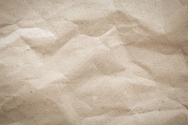 Arka plan için eski kağıt kumaş yüzeyi. Geri dönüşüm soluk kahverengi kağıt buruşuk doku, krem rengi geri dönüştürülmüş Kraft kağıt dokusu ve metin alanı için boş metin alanı.