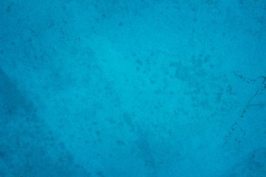 Yaz duvar kâğıdında arka plan için koyu mavi beton yapı. Çimento ve tondan oluşan kum duvar çok az. Açık renkli beton duvar, çimento deseni tasarım için nane yeşili..