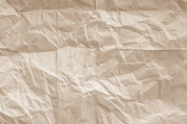 Arka plan için eski kağıt kumaş yüzeyi. Geri dönüşüm soluk kahverengi kağıt buruşuk doku, krem rengi geri dönüştürülmüş Kraft kağıt dokusu ve metin alanı için boş metin alanı.