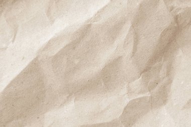 Arka plan için eski kağıt kumaş yüzeyi. Geri dönüşüm soluk kahverengi kağıt buruşuk doku, krem rengi geri dönüştürülmüş Kraft kağıt dokusu ve metin alanı için boş metin alanı.