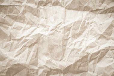 Arka plan için eski kağıt kumaş yüzeyi. Geri dönüşüm soluk kahverengi kağıt buruşuk doku, krem rengi geri dönüştürülmüş Kraft kağıt dokusu ve metin alanı için boş metin alanı.