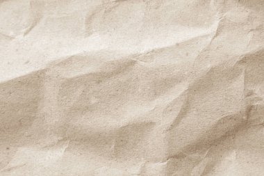 Arka plan için eski kağıt kumaş yüzeyi. Geri dönüşüm soluk kahverengi kağıt buruşuk doku, krem rengi geri dönüştürülmüş Kraft kağıt dokusu ve metin alanı için boş metin alanı.