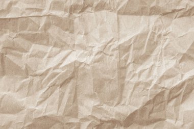 Arka plan için eski kağıt kumaş yüzeyi. Geri dönüşüm soluk kahverengi kağıt buruşuk doku, krem rengi geri dönüştürülmüş Kraft kağıt dokusu ve metin alanı için boş metin alanı.