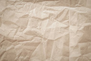 Arka plan için eski kağıt kumaş yüzeyi. Geri dönüşüm soluk kahverengi kağıt buruşuk doku, krem rengi geri dönüştürülmüş Kraft kağıt dokusu ve metin alanı için boş metin alanı.