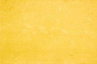 Yaz duvar kağıdındaki arka plan için sarı beton doku. Çimento ve tondan oluşan kum duvar çok az. Açık turuncu renkli beton duvar, ev dekorasyonu için beyaz çimento dokusu..