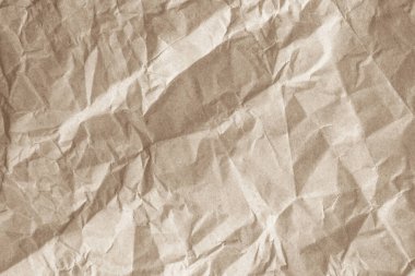 Arka plan için eski kağıt kumaş yüzeyi. Geri dönüşüm soluk kahverengi kağıt buruşuk doku, krem rengi geri dönüştürülmüş Kraft kağıt dokusu ve metin alanı için boş metin alanı.