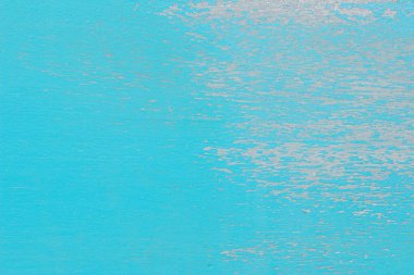 Eski grunge ahşap doku arka planı. Klasik mavi ve beyaz soyulan tahta duvarlar mobilya tasarımı için antika çatlama tarzı nesnelere sahiptir. Boyanmış eskimiş masa ahşap işçiliği boş..