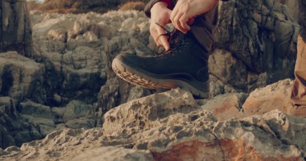 Man Adjusts Laces His Hiking Boots High Mountains — Stock video