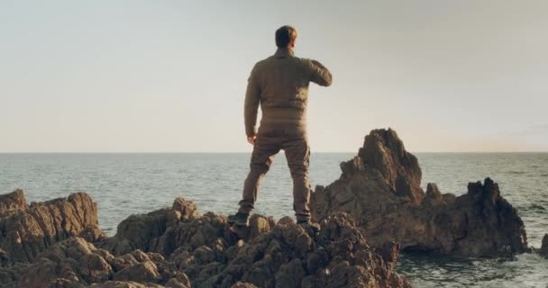 Adult Man Stands Seashore Look Ahead — Stockvideo