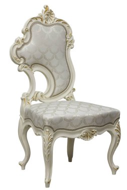 Elegant white chair with patterned upholstery and decorative carvings. Classic or antique design. Luxurious furniture for interior design. clipart