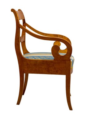 Biedermeier style armchair isolated on a white background. Light-colored wood with scrolled armrests and a striped upholstered seat. Elegant 19th-century design. clipart