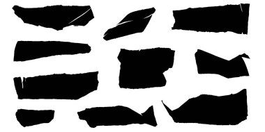 Kırsal bir ahşap yüzey üzerinde uzanan yırtık kağıt parçaları, geçmiş düşünceler, yaratıcılık ve keşfedilmeyi bekleyen potansiyel fikirler hakkında sessiz hikayeler anlatıyor..