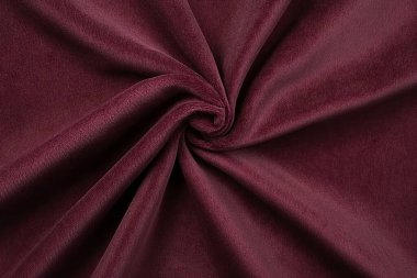 Bu koyu bordo kadife kumaş lüks ve yumuşak bir dokuya sahiptir, döşeme, moda aksesuarları veya ev dekorasyonu için mükemmeldir. Zengin rengi, sofistike olan her ayarı güçlendirir..
