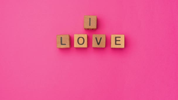 Stop Motion Wooden Cubes Phrase Love You Maybe Empty Colorful — Stock video