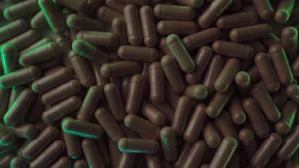 Een Hoop Ginkgo Biloba Tabletten Capsules Draaien Langzaam Veelkleurig Neon — Stockvideo