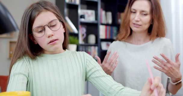 Woman Explains Bored Sad Daughter Homework Stressed Upset Kid Studying — Stock Video