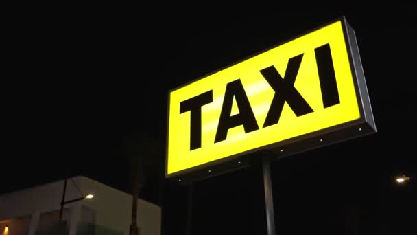 Yellow Taxi Billboard Seen Night Big City Transportation Sign Nighttime — Stock Video